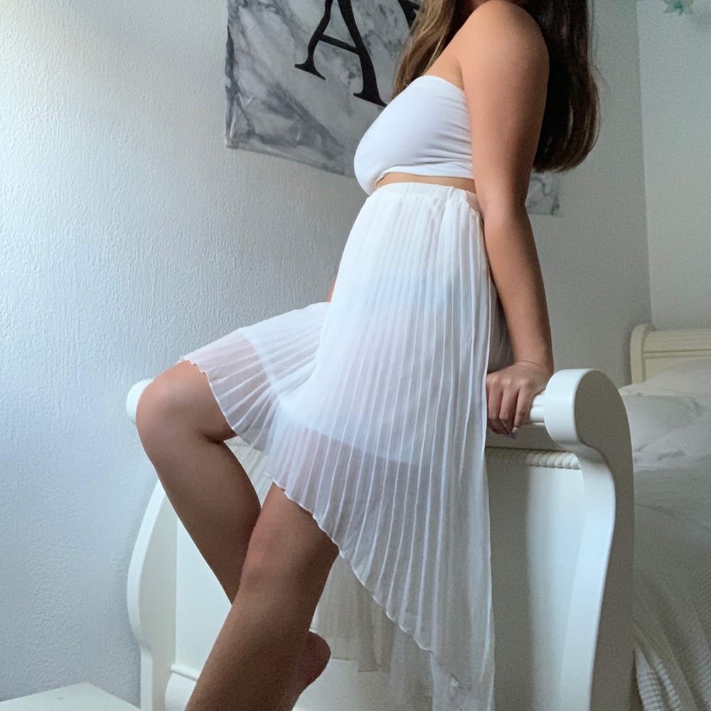 white pleated high low skirt